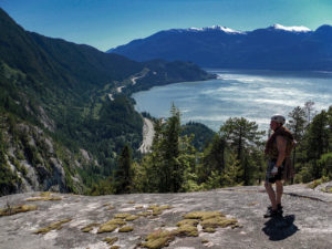 Dale Cody on summit of Squamish Chief cliff